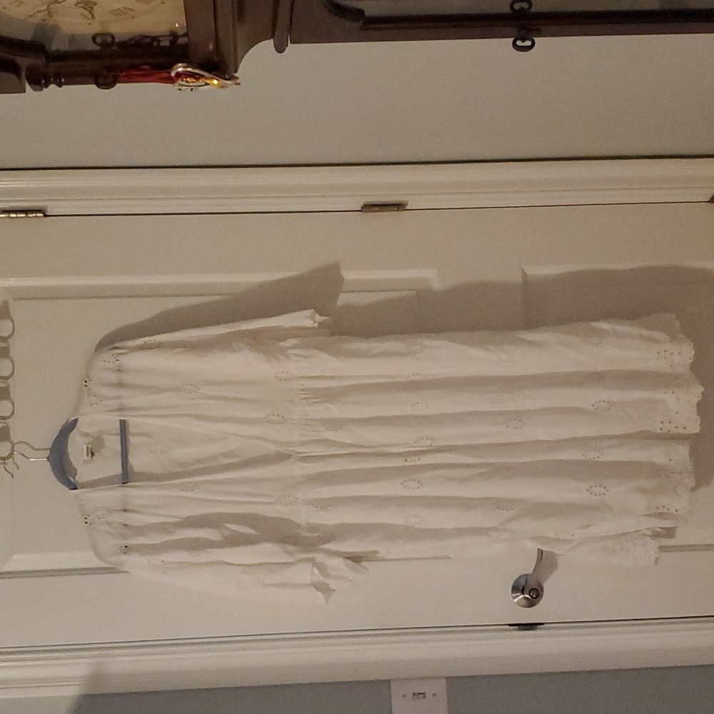 White eyelet duster